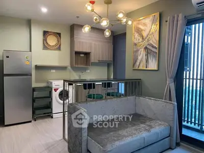 Modern living room with stylish decor and open kitchen layout