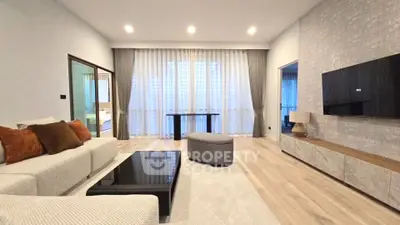 Spacious modern living room with elegant decor and natural light