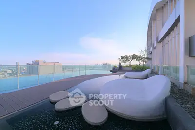 Luxurious rooftop with stunning city view and modern seating area