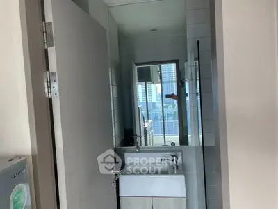 Modern bathroom with city view and sleek fixtures