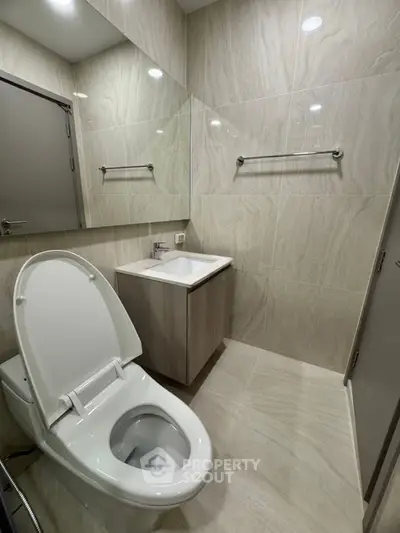 Modern bathroom with sleek design and elegant fixtures in a contemporary home.
