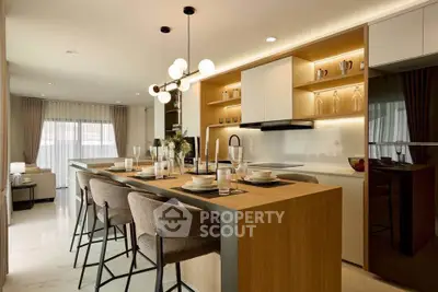 Luxurious modern kitchen with open layout and elegant dining area