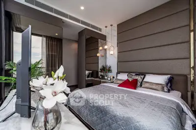 Luxurious modern bedroom with elegant decor and large window view