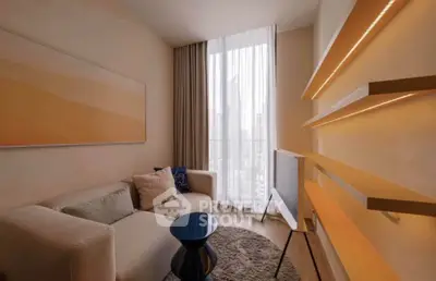 Modern living room with stylish decor and city view, featuring a cozy sofa and elegant shelving.