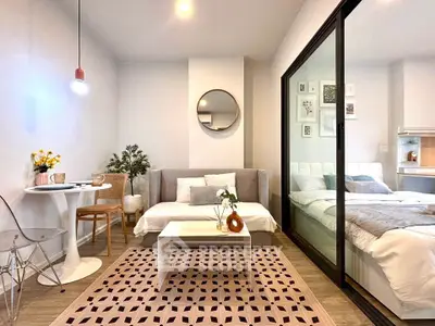 Modern studio apartment with stylish decor and cozy living area