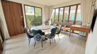 Bright and airy living room with modern furniture and large windows