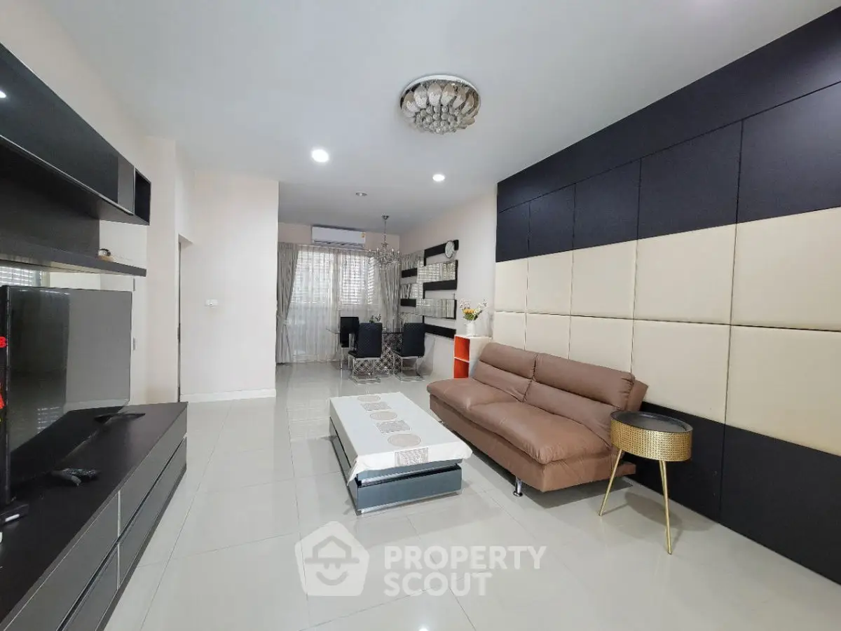 Modern living room with sleek design and stylish furniture