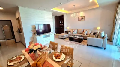 Spacious modern living room with elegant dining area and stylish decor
