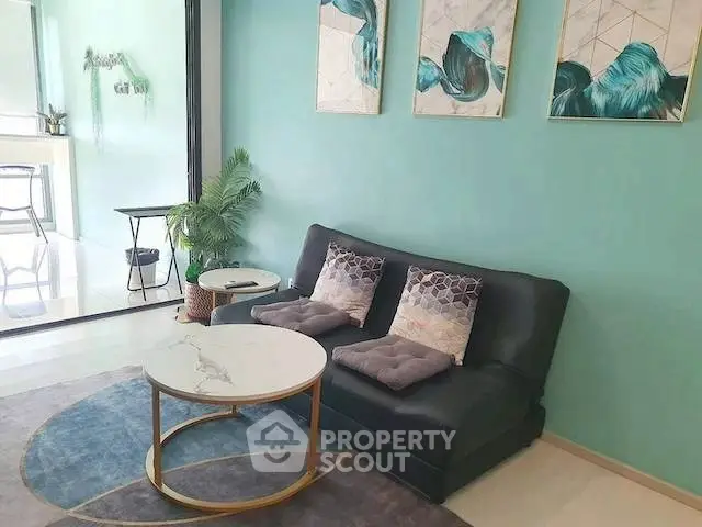 Stylish living room with modern decor and elegant furniture in a cozy apartment.