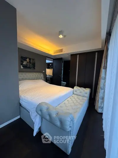 Luxurious bedroom with elegant decor and plush furnishings in modern apartment