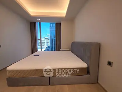 Luxurious bedroom with city view and modern design