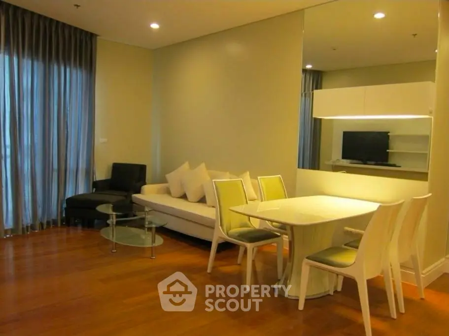 Modern living room with elegant dining area and stylish furniture