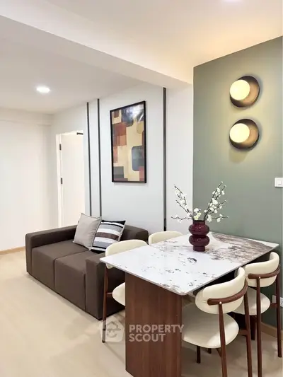 Stylish modern living room with elegant dining area and contemporary decor