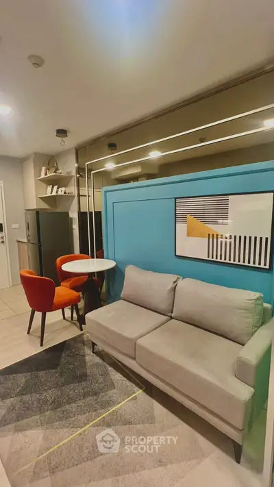 Modern living room with stylish decor and vibrant accents