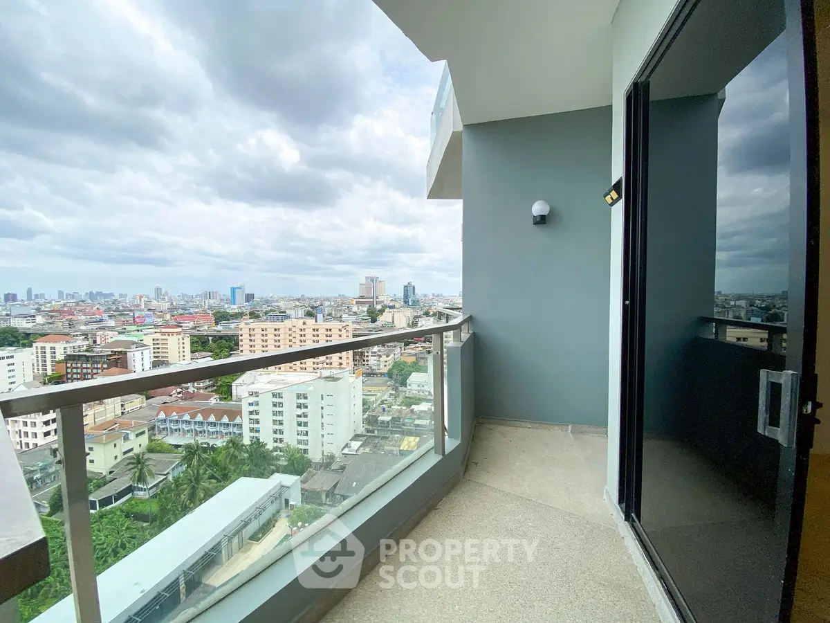 Stunning cityscape view from a modern high-rise balcony, perfect for urban living enthusiasts.
