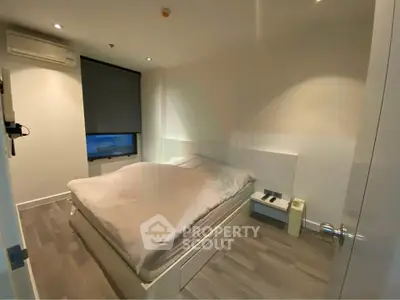Modern bedroom with minimalist design and cozy ambiance