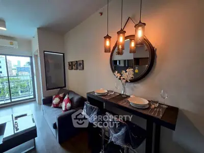Stylish living room with modern decor and balcony view in urban apartment