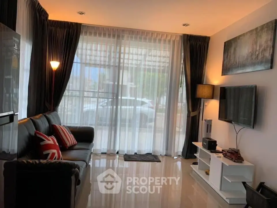 Elegant living room with glossy tiled floors, modern furniture, and ample natural light filtering through sheer curtains.