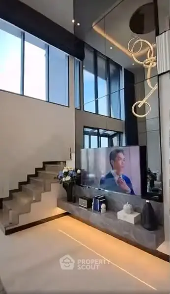 Luxurious modern living room with high ceilings and stylish decor