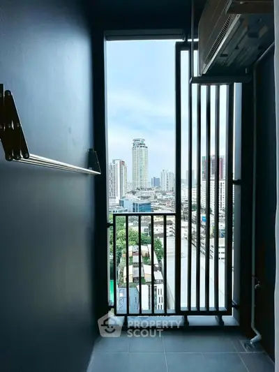 Modern high-rise balcony with stunning cityscape view, perfect for urban living enthusiasts.
