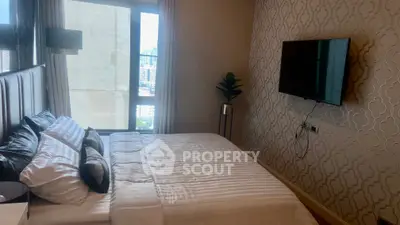 Modern bedroom with stylish wallpaper and city view from window