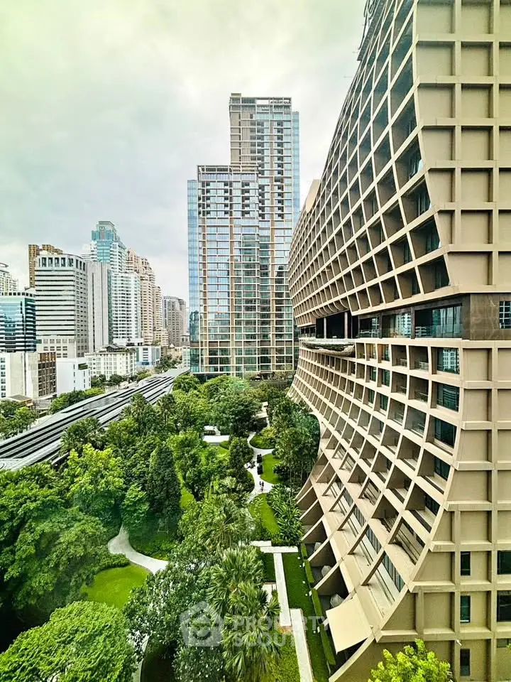 Stunning urban view with modern architecture and lush greenery in a vibrant cityscape.