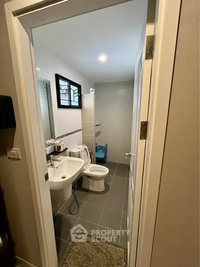 Modern bathroom with sleek fixtures and stylish tile design