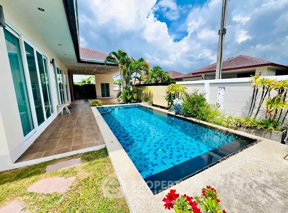 Luxurious private villa with stunning pool and lush garden, perfect for relaxation and entertaining.