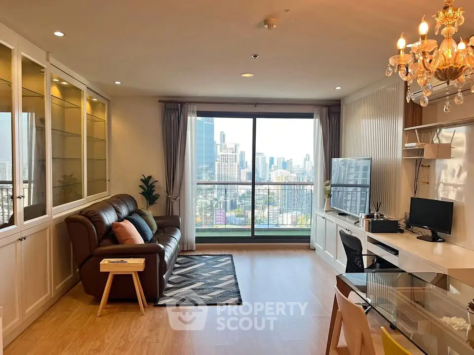 Spacious living room with city view, elegant decor, and modern amenities