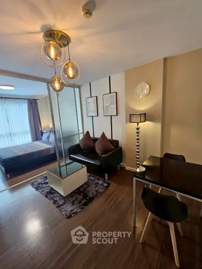 Modern studio apartment with stylish lighting and cozy decor
