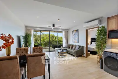 Spacious modern living room with open layout and balcony view