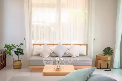 Bright and airy living room with modern decor and natural light