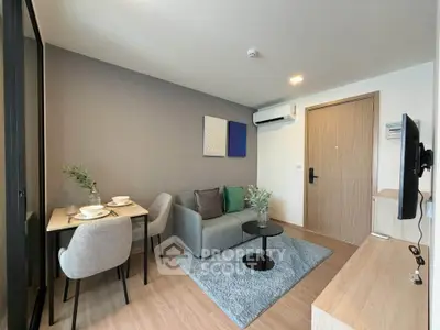 Modern living room with cozy seating and dining area in stylish apartment