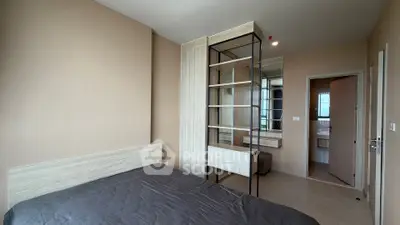 Modern bedroom with stylish shelving and neutral tones