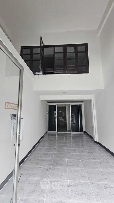 Spacious commercial space with mezzanine and glass doors