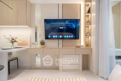 Modern living room with wall-mounted TV and stylish decor