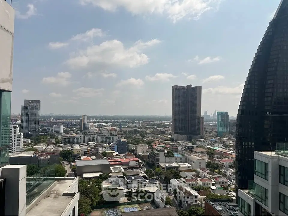 Stunning cityscape view from a high-rise building, showcasing urban skyline and expansive horizon.