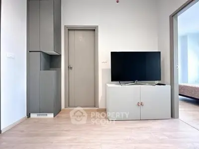 Modern living room with sleek TV setup and minimalist design