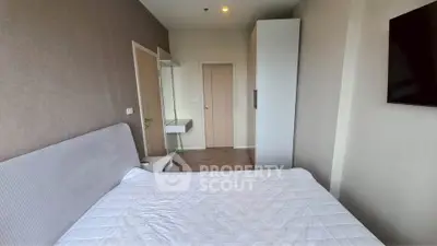 Modern bedroom with minimalist design and cozy ambiance