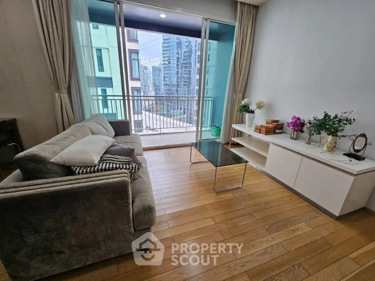 Modern living room with balcony view in urban apartment