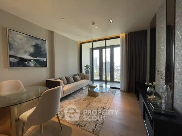 Modern living room with large windows and stylish decor, offering a bright and inviting atmosphere.