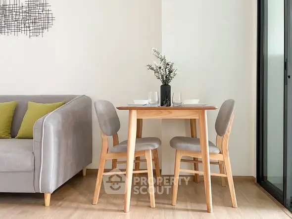 Modern living room with cozy dining area and stylish decor