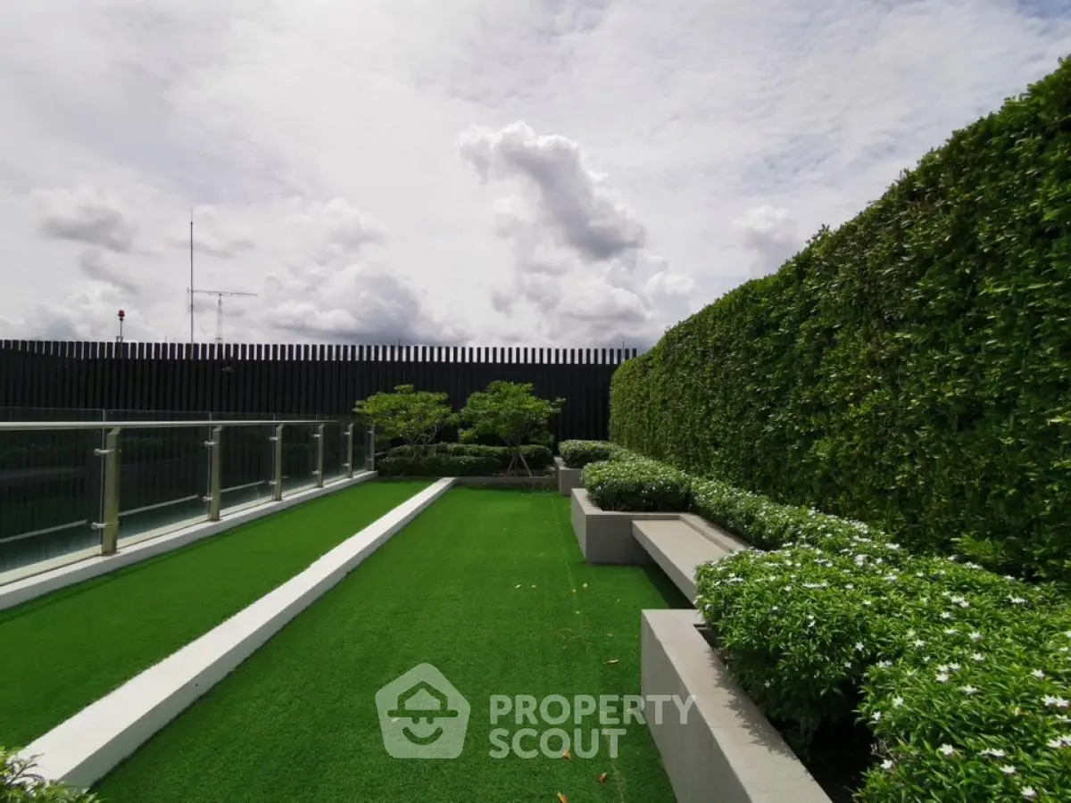 Luxurious rooftop garden with lush greenery and modern design