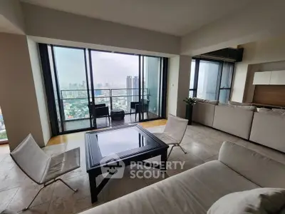 Spacious living room with stunning city view and modern furniture