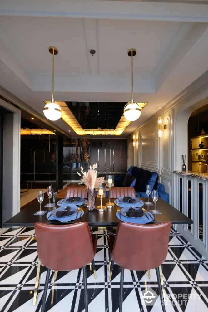 Luxurious dining room with elegant decor and modern lighting in a stylish apartment.