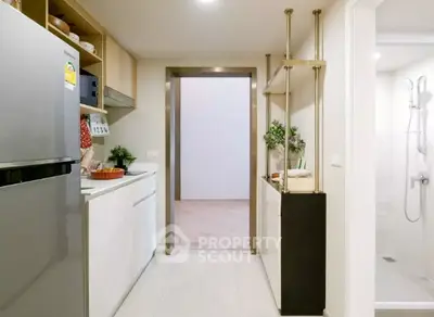 Modern kitchen with sleek appliances and open layout design