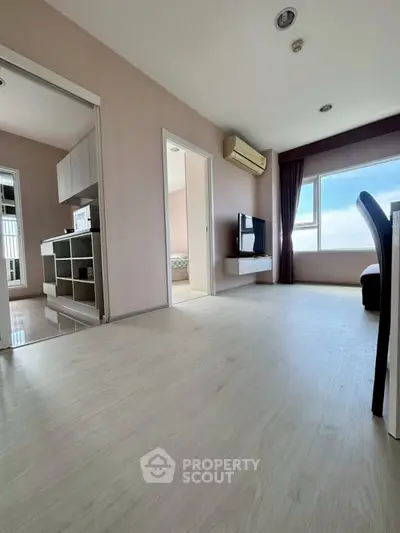 Spacious living room with modern design and natural light