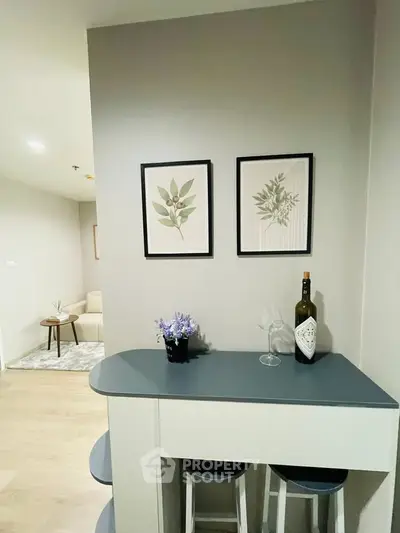 Modern apartment interior with stylish bar counter and cozy living area