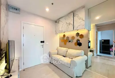 Modern living room with stylish decor and cozy sofa in a contemporary apartment.