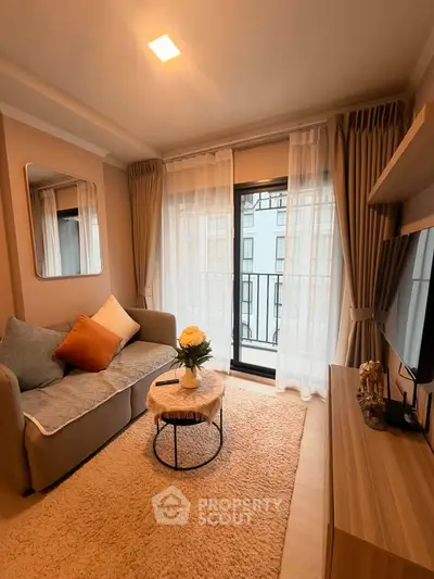 Cozy living room with modern decor and balcony view